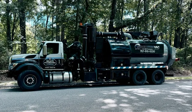 Side profile of a Beach HydroVac vacuum excavation truck serving Arlington