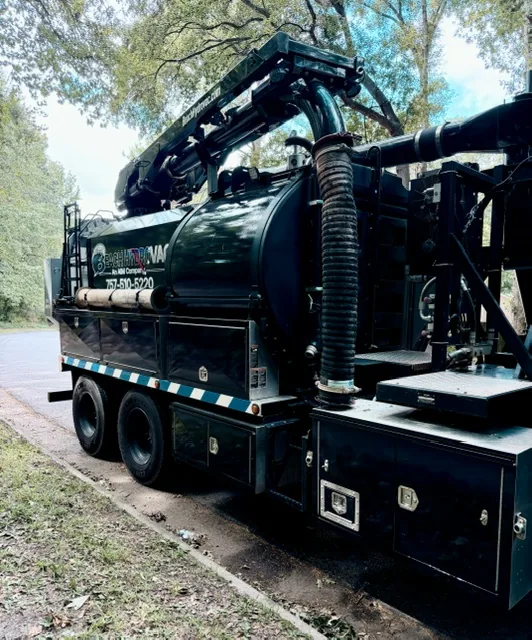 Vacuum boom and hose on a Beach HydroVac hydro excavation truck serving Henrico